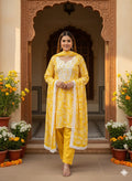Yellow printed kurta with lace work and pants